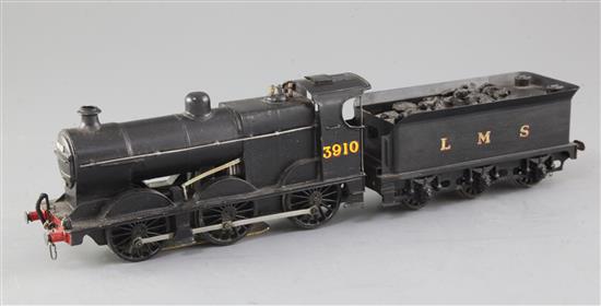 A 4F 0-6-0 LMS tender locomotive, number 3910, black livery, 3 rail with skate, overall 37cm